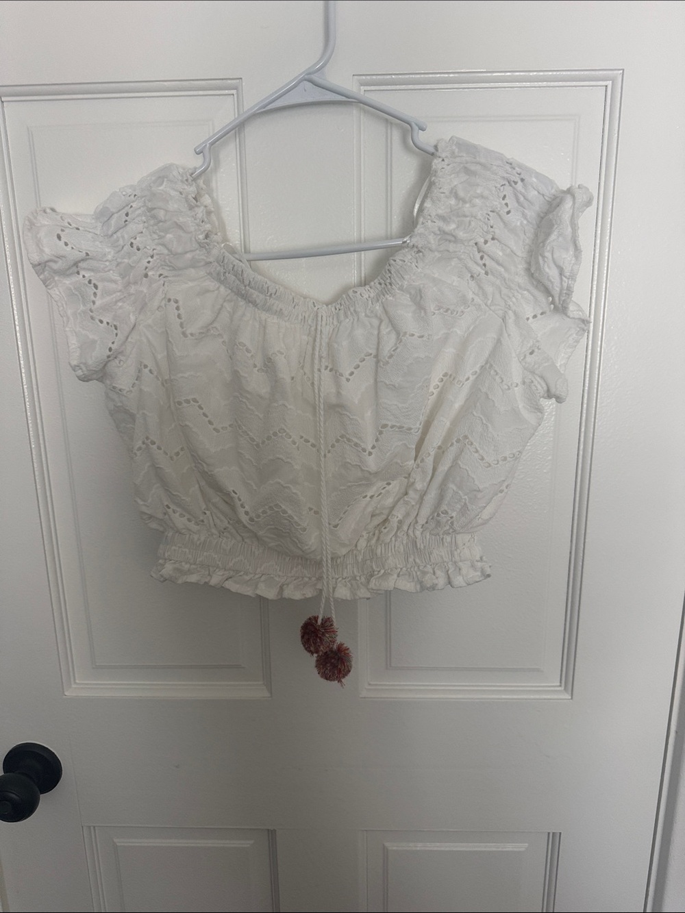 Moon River White Eyelet Off-Shoulder Crop Top with Pom Tassels